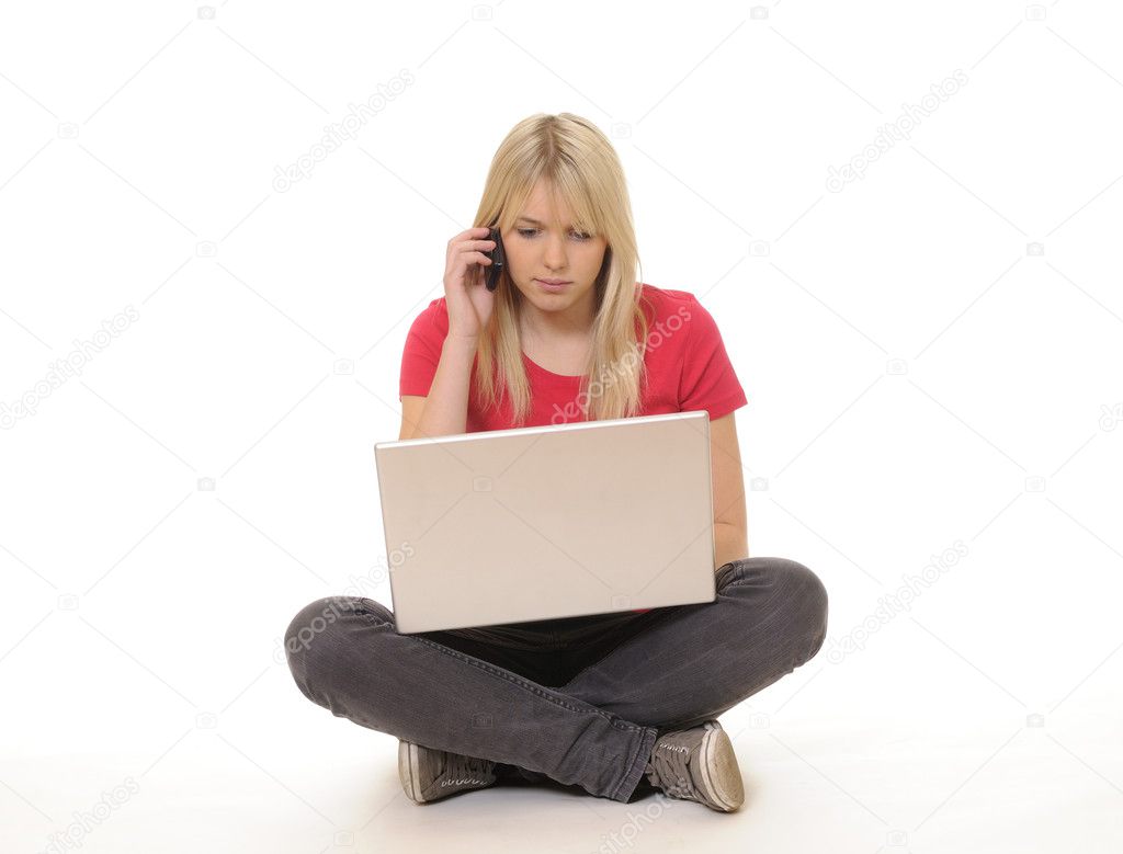 Woman with laptop and handy