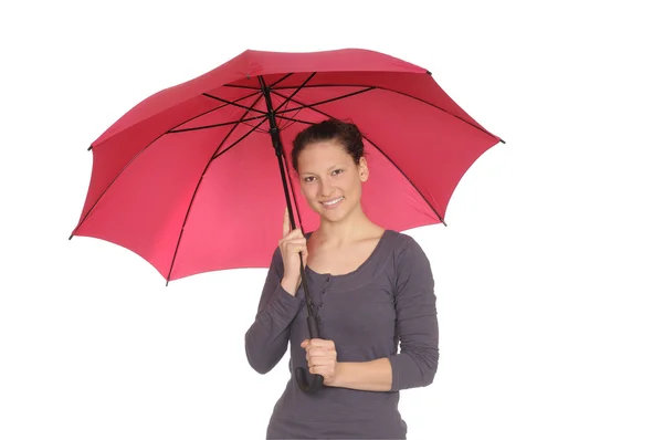 Ung kvinna med rött paraply — Stockfoto
