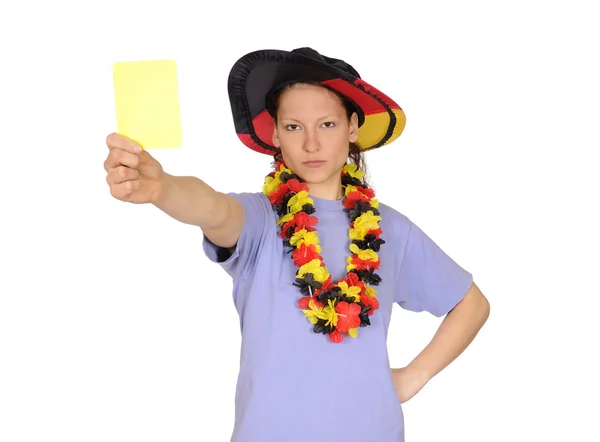 Футбольний вентилятор показує жовту картку — стокове фото