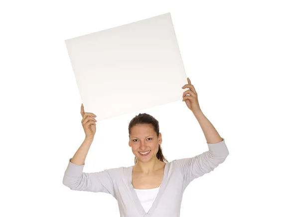 Młoda kobieta z biały billboard — Zdjęcie stockowe