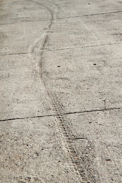Track in cement trowalk — стоковое фото