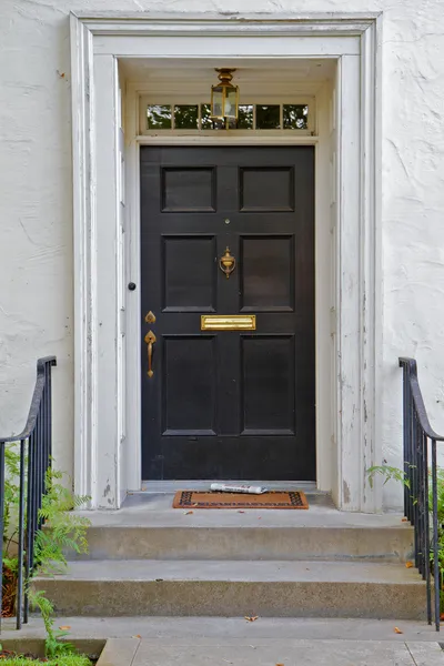 Black front door — Stock Photo, Image