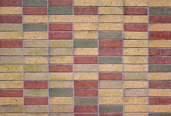 Tan red and green bricks — Stock Photo, Image