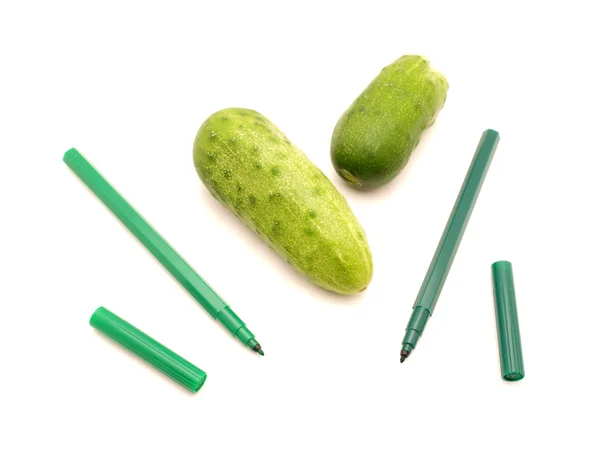 Cucumbers and felt-tip pens — Stock Photo, Image