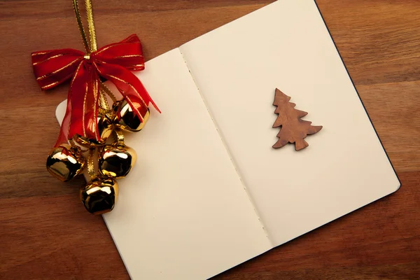 Blank Notebook With Christmas Bell — Stock Photo, Image