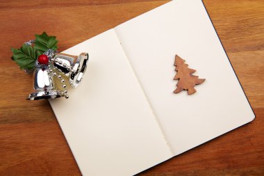 Blank Notebook With Christmas Bell clipart