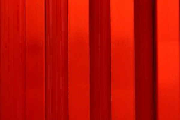 Punainen seinä taustakäyttöön — kuvapankkivalokuva