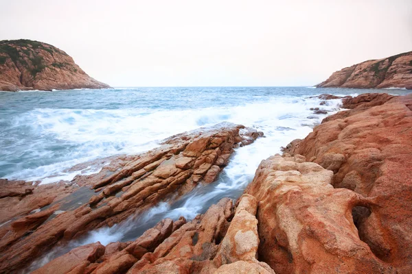 Beautiful seascape. Sea and rock at the sunset. Nature compositi — Stock Photo, Image