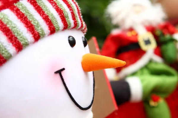Karácsonyi háttér a télapó és a hóember kirakós — Stock Fotó