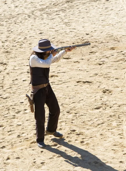Sheriff shooting his rifle — Stock Photo, Image