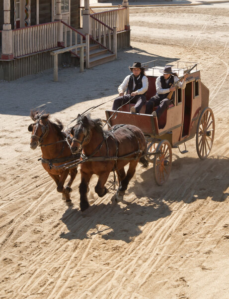 Sheriff and his Deputy driving a stagecoach