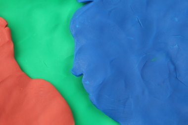 Çok renkli çocuk oyuncağı kil arka plan.