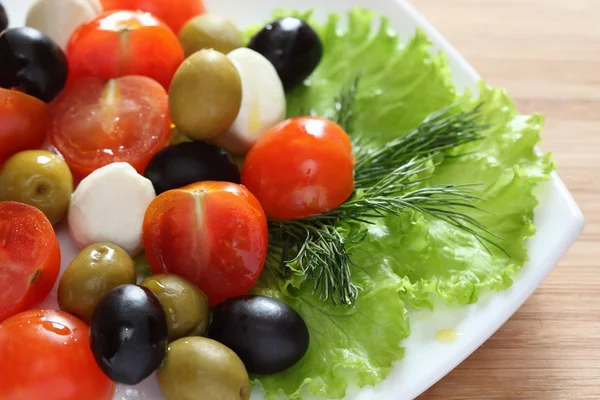 stock image Fresh Salad with Tomato, Mozzarella and Olives.