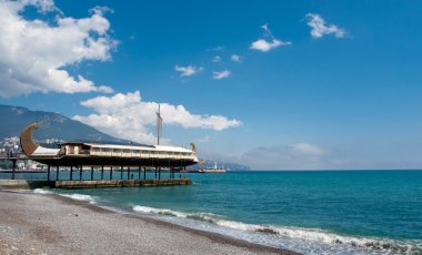 Yalta embankment. View of the ship - restaurant. clipart