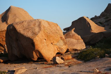 Boulders in desert mountains clipart