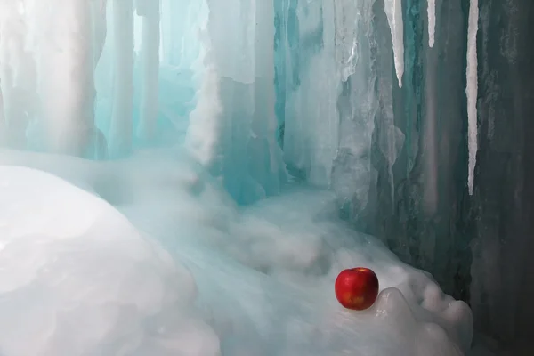 Frozen waterfall and apple — Stock Photo, Image