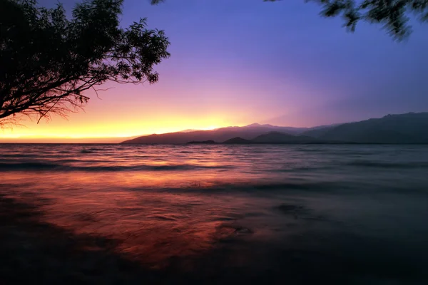 Horské jezero západ slunce — Stock fotografie