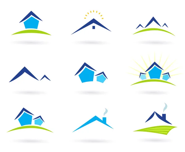 Iconos de logotipo de bienes raíces / casas aislados en blanco azul y verde — Archivo Imágenes Vectoriales