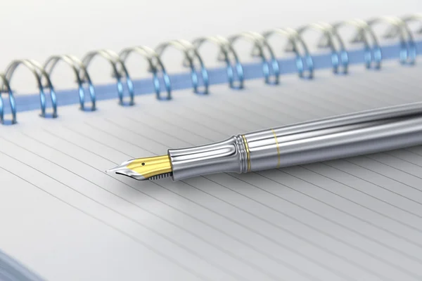 Metal fountain pen on notebook — Stock Photo, Image
