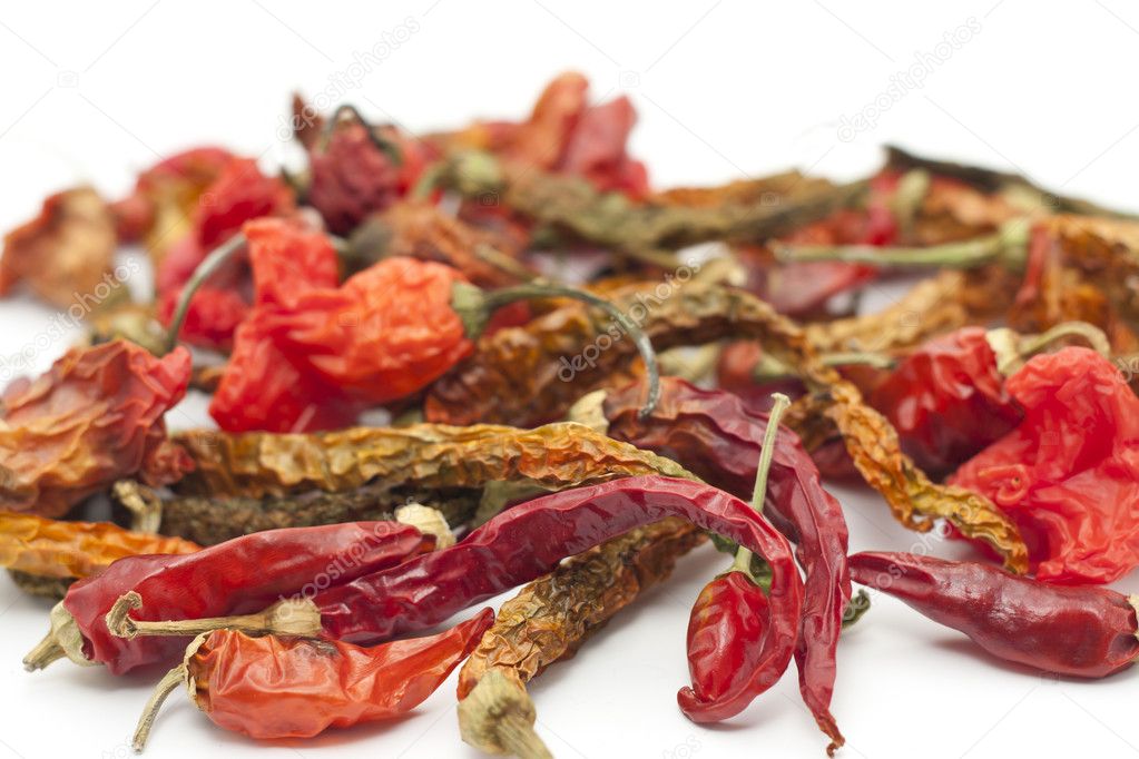 Dry red chili peppers — Stock Photo © tomisl.z #5086622