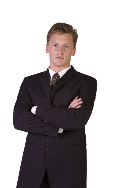 Primer plano de un hombre de negocios bien vestido con los brazos cruzados — Foto de Stock