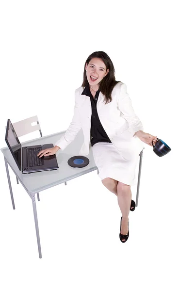Sexy vrouw zitten op het Bureau — Stockfoto
