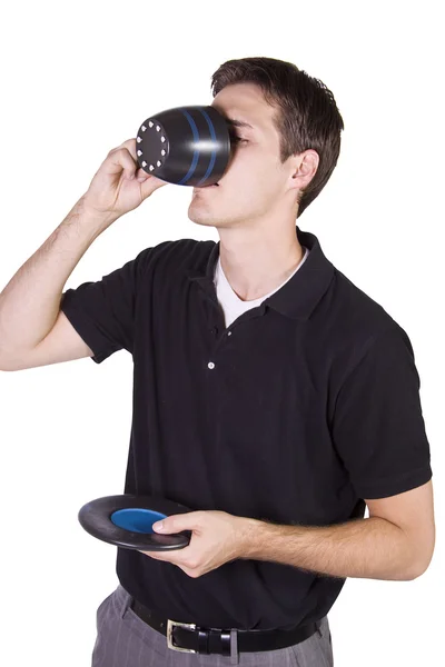 Mladý muž, držící šálek kávy — Stock fotografie