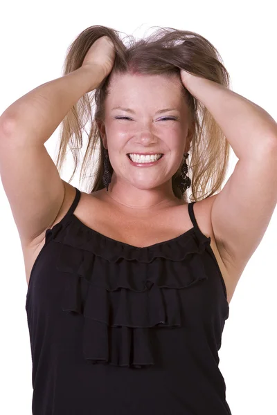 Zblízka mladé ženy, tahání její vlasy — Stock fotografie