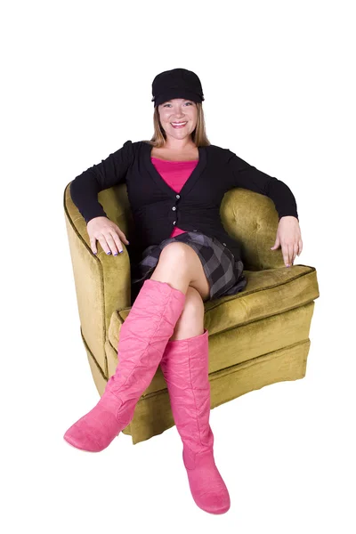 Sexy model wearing stylish outfit with cap and long boots — Stock Photo, Image