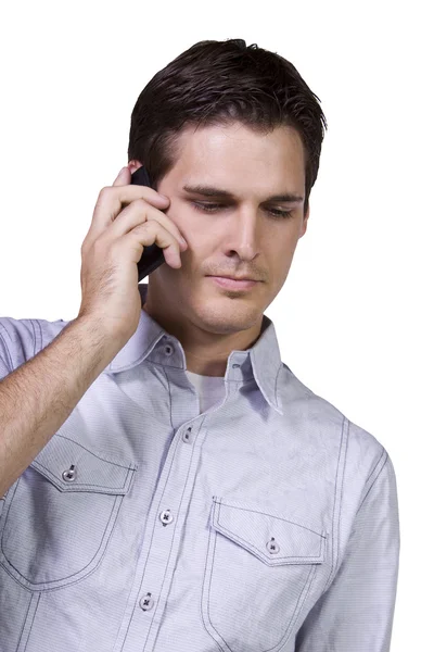 Young businessman conversing on cell phone — Stock Photo, Image