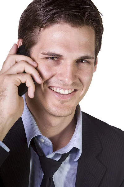 Joven hombre de negocios conversando por teléfono celular —  Fotos de Stock