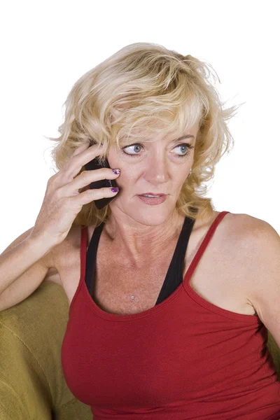 Kobieta rozmowy na telefon komórkowy w jej domu — Zdjęcie stockowe