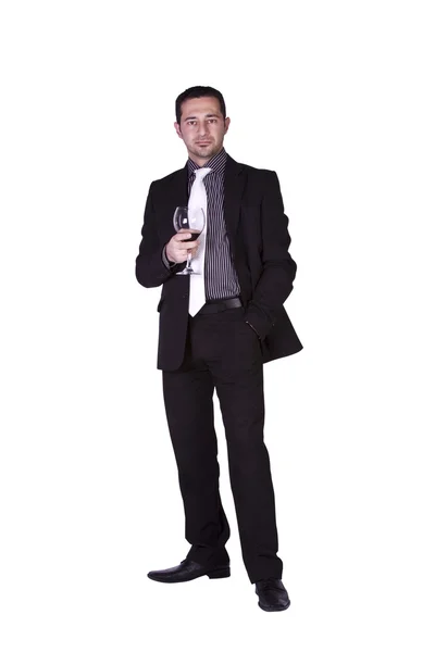 Biznesmen obchodzi ze szklanką napoju — Zdjęcie stockowe