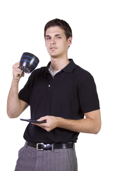 Young man holding cup of coffee — Stock Photo, Image