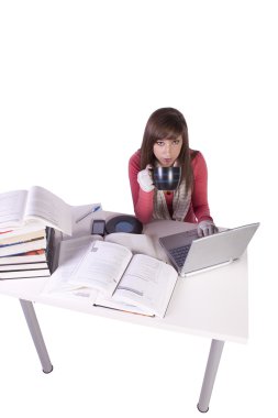 Young high school student studying for exams clipart