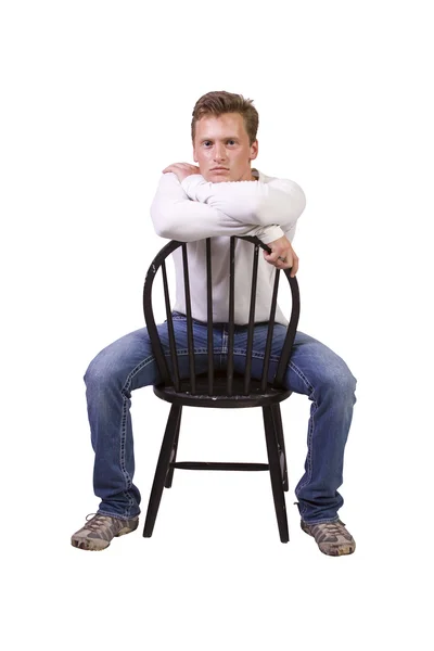Homem branco sentado na cadeira relaxado — Fotografia de Stock