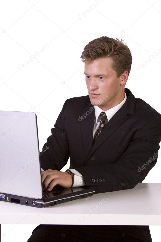 Young business entrepreneur working on laptop