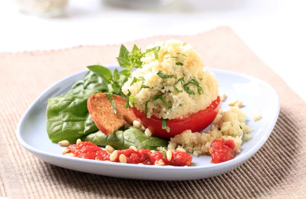 Couscous stuffed tomato — Stock Photo, Image