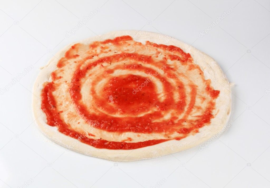 Pizza dough and tomato paste Stock Photo by ©ajafoto 4505928