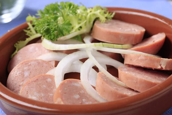 Sliced sausages and onion — Stock Photo, Image