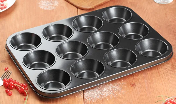 12-cup muffin tin — Stockfoto