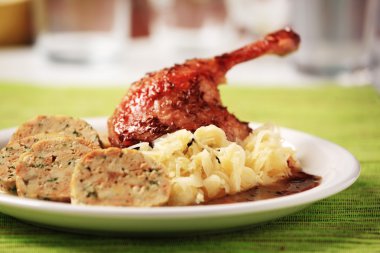 Roast Duck with Cabbage and Bread Dumplings - Czech cuisine clipart