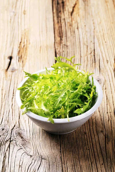 Bowl of salad greens — Stock Photo, Image