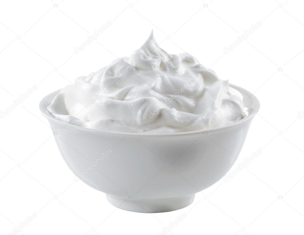 Bowl of cream isolated on white