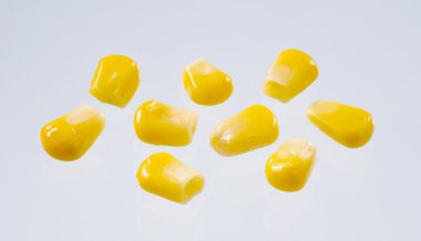 Closeup of boiled sweetcorn kernels clipart