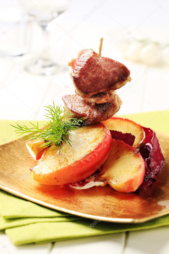 Roasted meat and baked apple