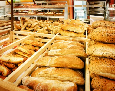 Variety of bread in a supermarket clipart