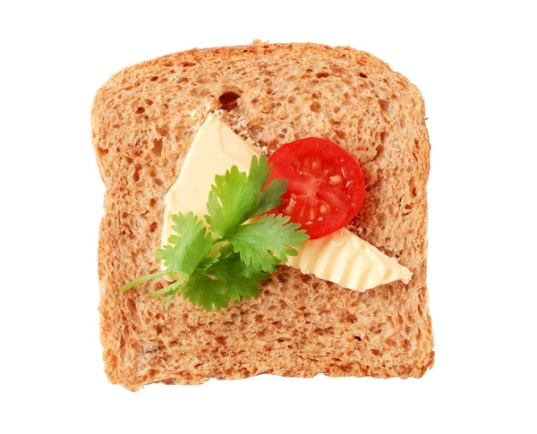 Hnědý chléb a máslo — Stock fotografie