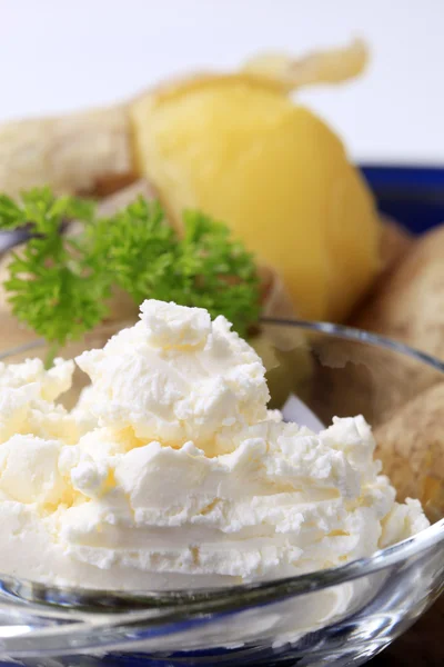Potatoes and cottage cheese — Stock Photo, Image