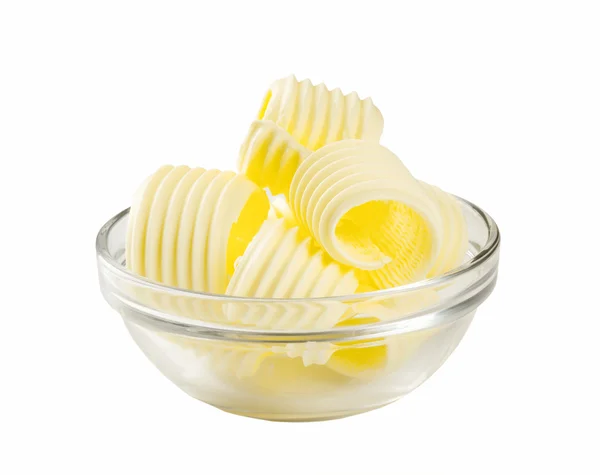 Butter curls in a glass bowl — Stock Photo, Image